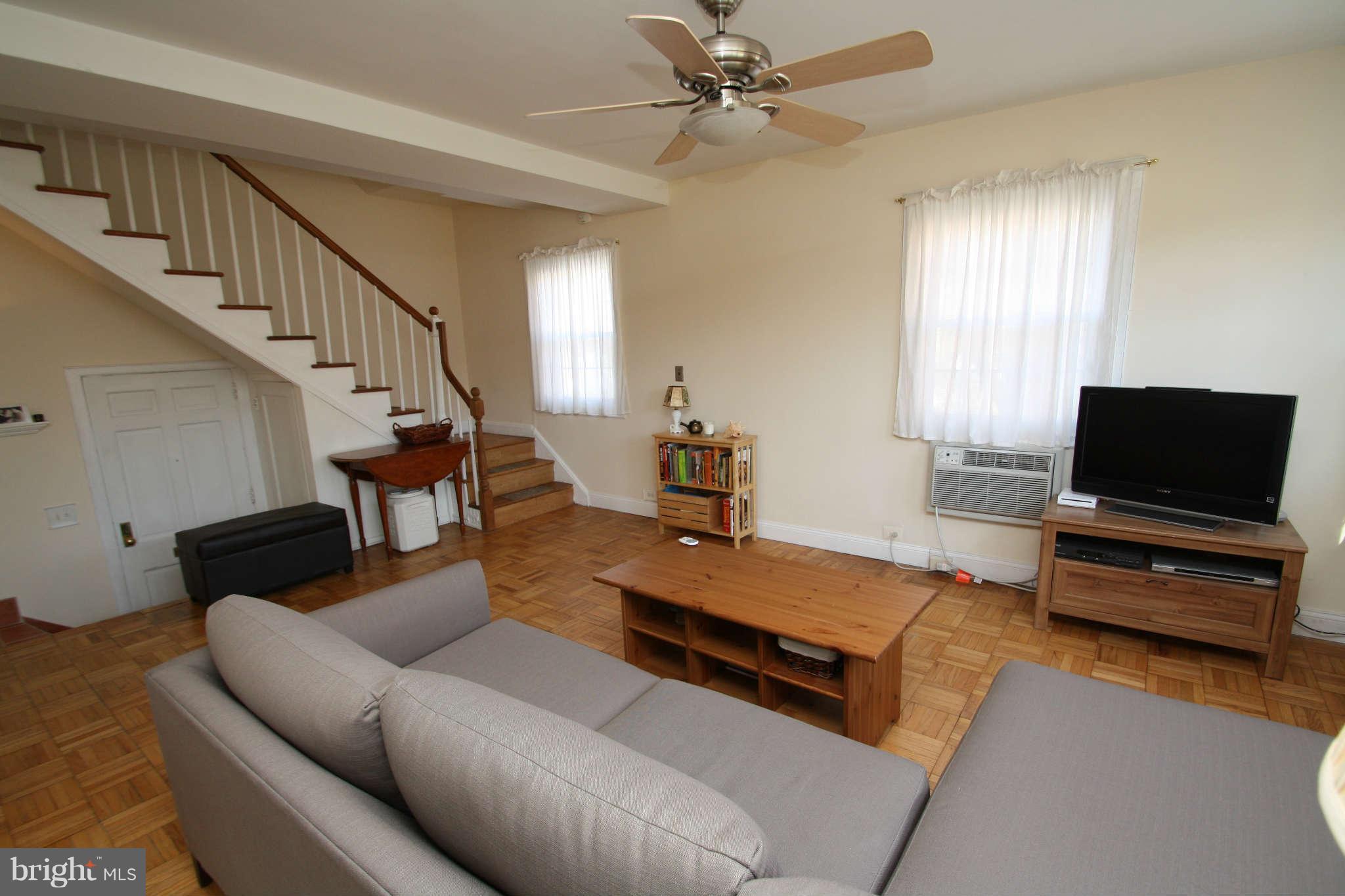 1634 Preston Road Alexandria, VA 22302 - Photo 5 of 19 a living room with furniture and a flat screen tv