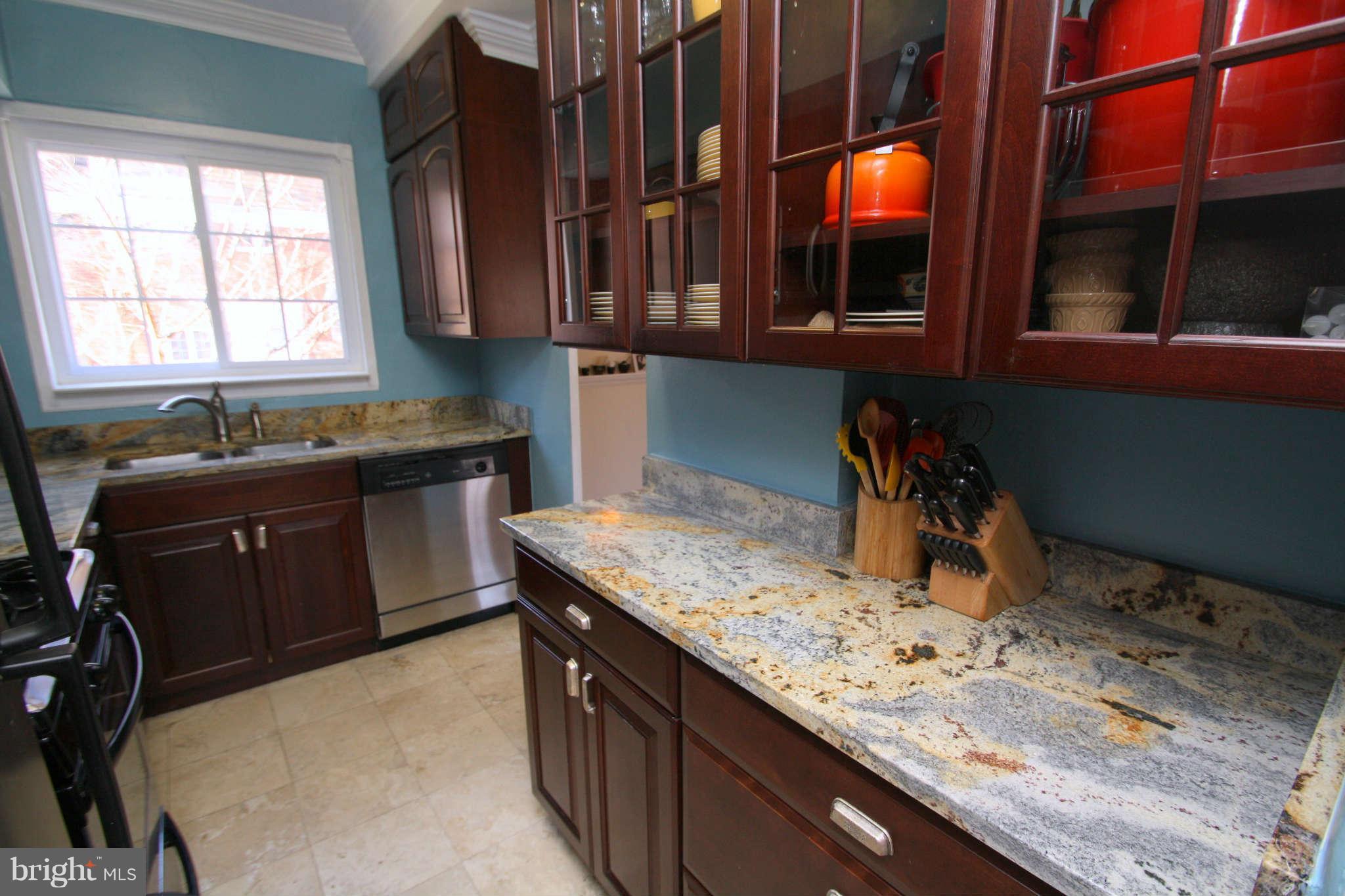 1634 Preston Road Alexandria, VA 22302 - Photo 7 of 19 a kitchen with stainless steel appliances granite countertop a sink a stove and a microwave oven