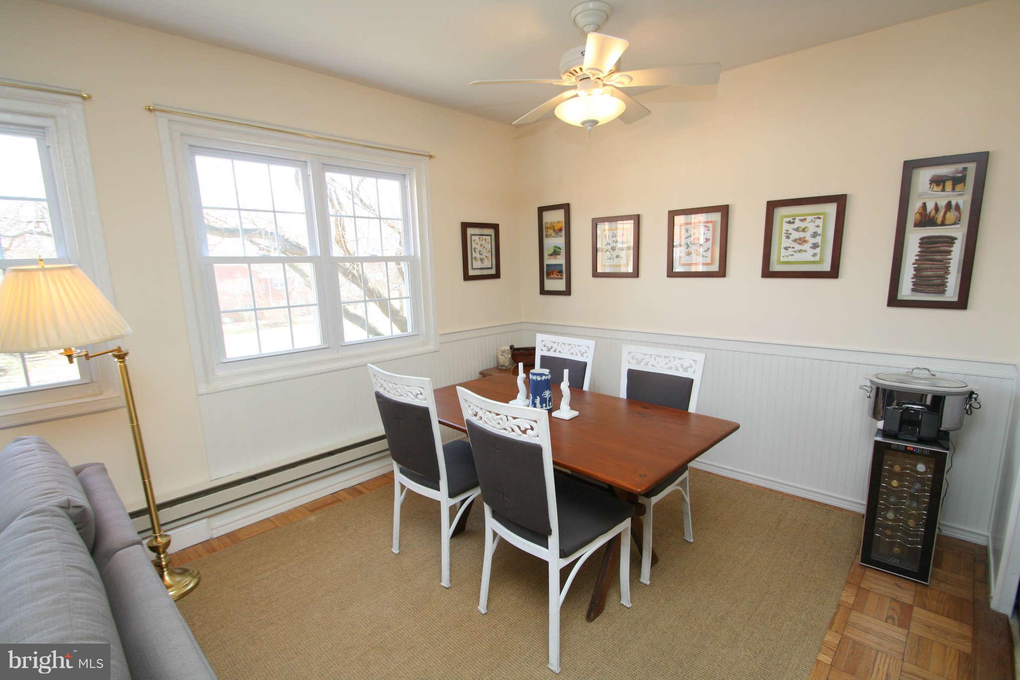 1634 Preston Road Alexandria, VA 22302 - Photo 9 of 19 a view of a dining room with furniture and a chandelier