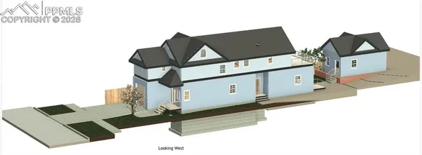 an aerial view of houses with yard