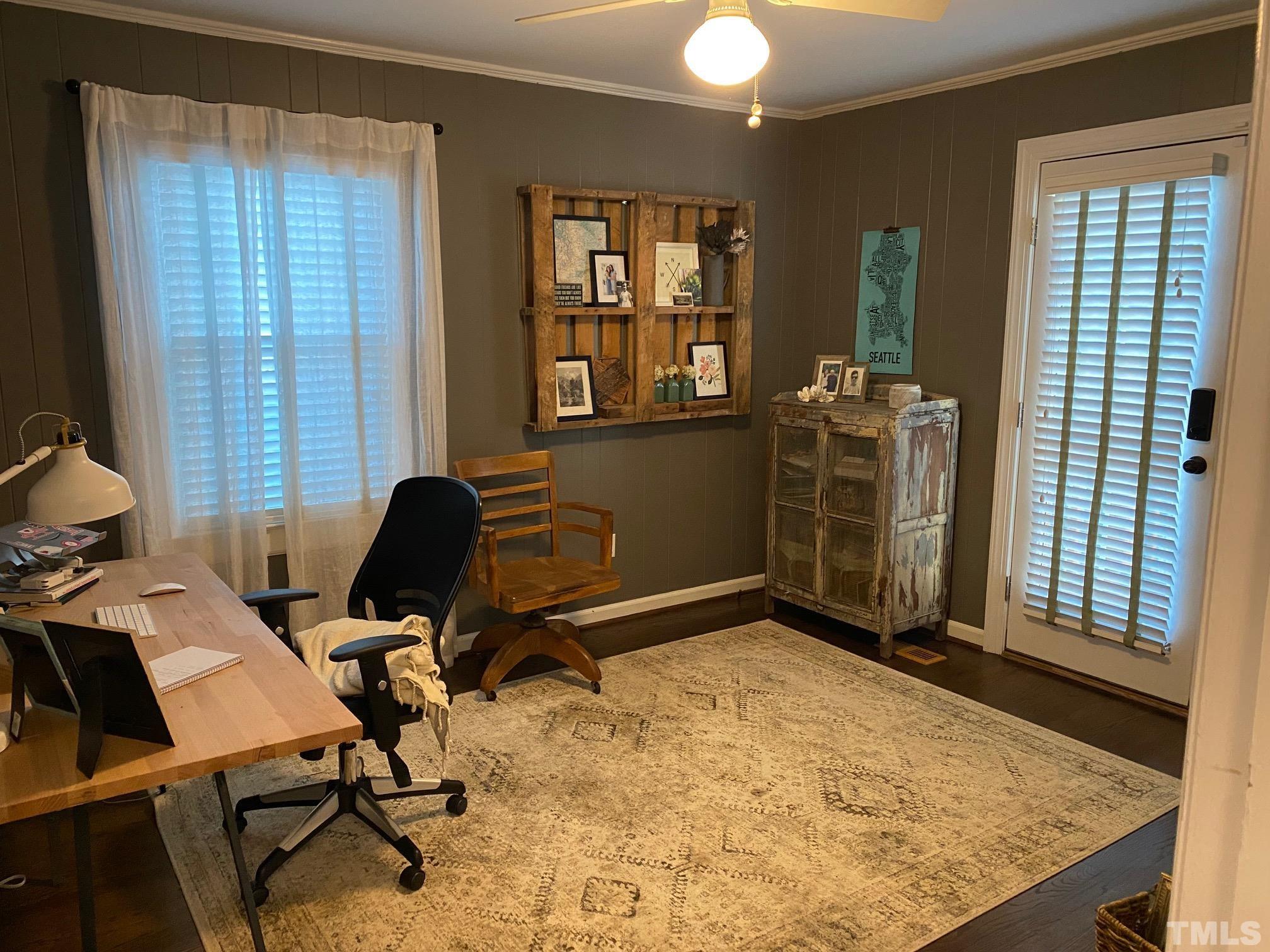2255 The Circle Raleigh, NC 27608 - Photo 4 of 6 a workspace with furniture and window