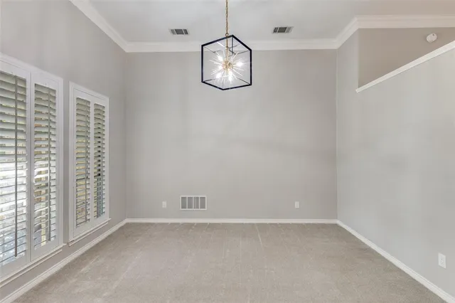 a view of a room with a large window