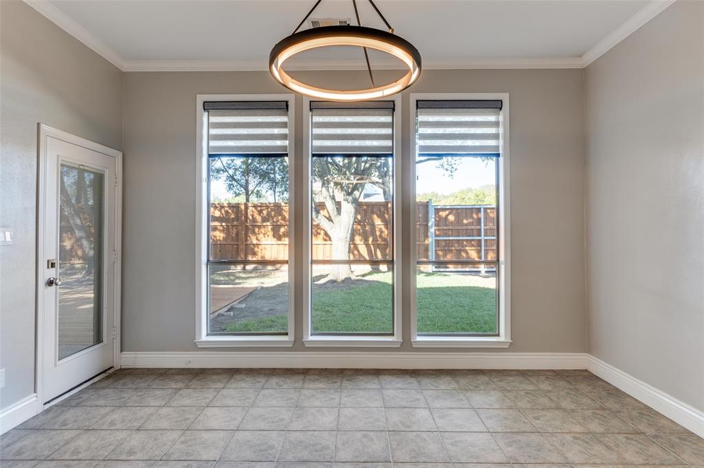 847 Turquoise Point Rockwall, TX 75032 - Photo 8 of 34 a bathroom with a large window and a sink