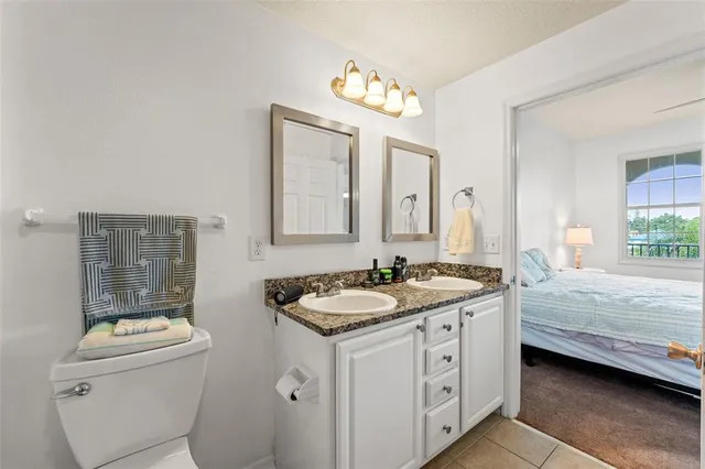 a bathroom with a bath tub with a shower