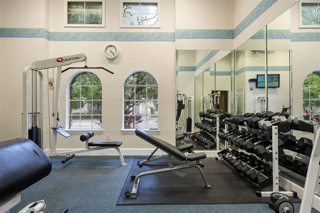 a brick building with a bench in front of it