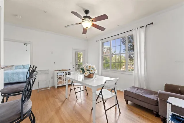 a kitchen with granite countertop a refrigerator stove and microwave