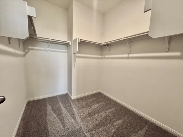 a bathroom with a sink toilet a shower and a mirror