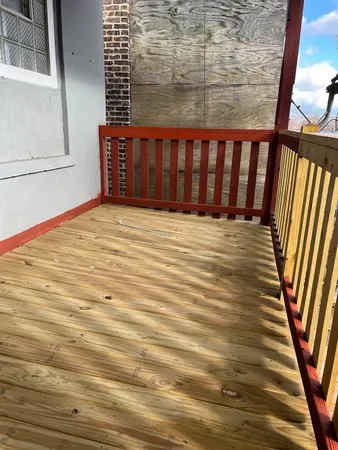 a view of a backyard with a patio