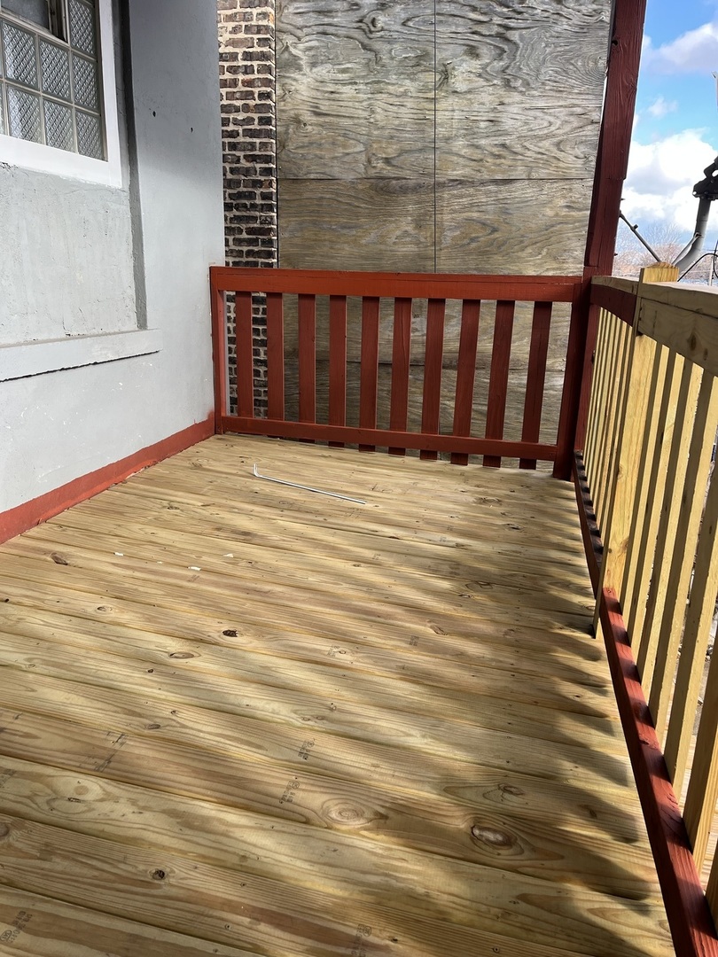 3057 West Flournoy Street, Unit 2 Chicago, IL 60612 - Photo 8 of 13 a view of wooden floor