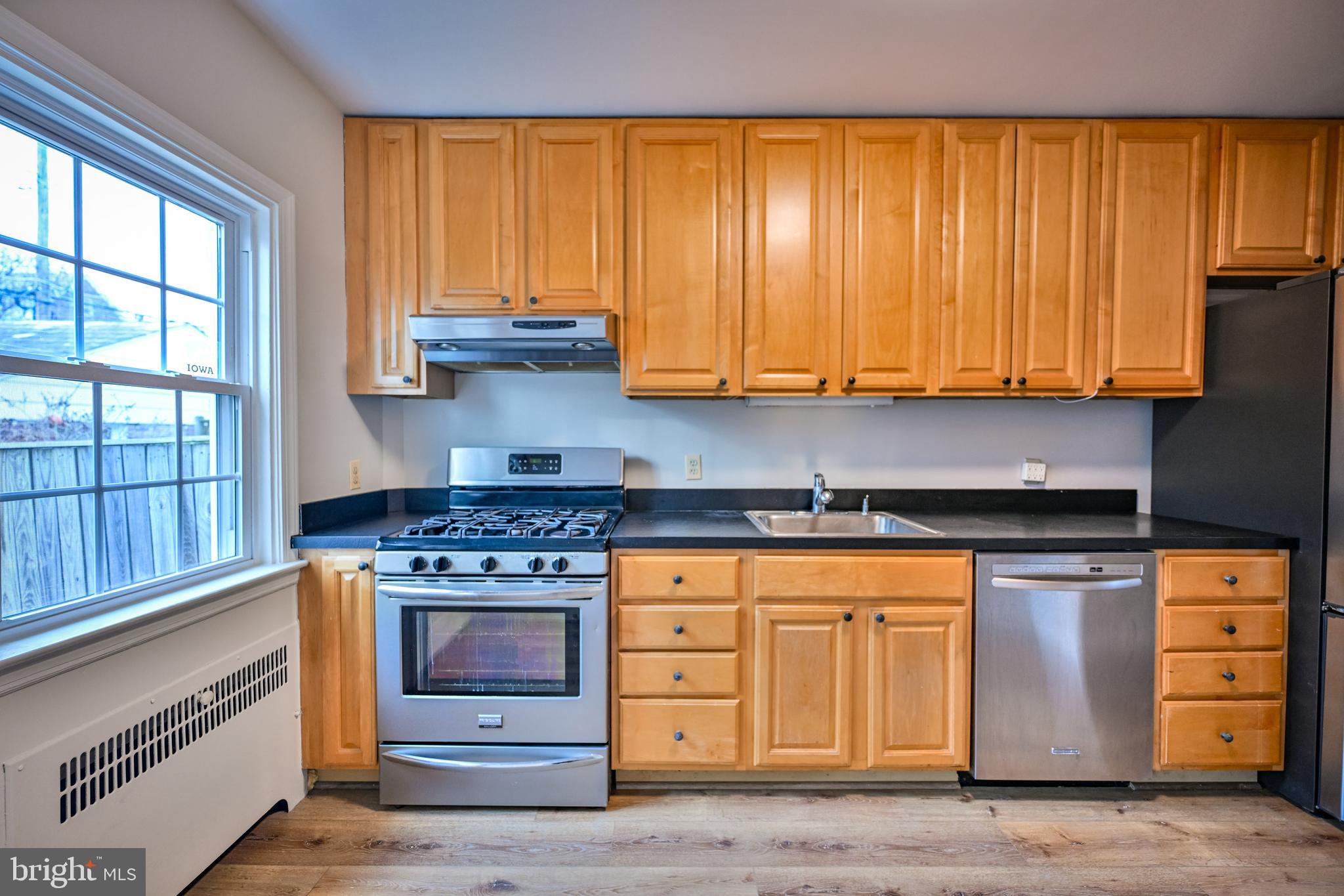 207 Murdock Road Baltimore, MD 21212 - Photo 12 of 45 Galley kitchen with tons of cabinet space