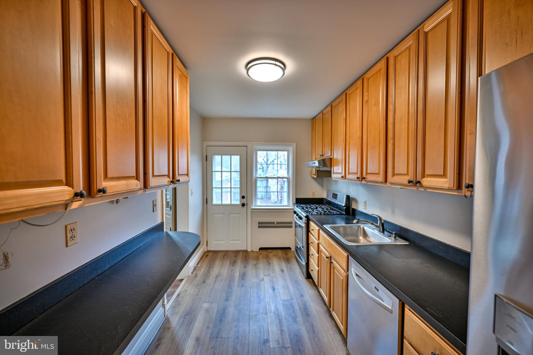 207 Murdock Road Baltimore, MD 21212 - Photo 15 of 45 Galley kitchen with tons of cabinet space