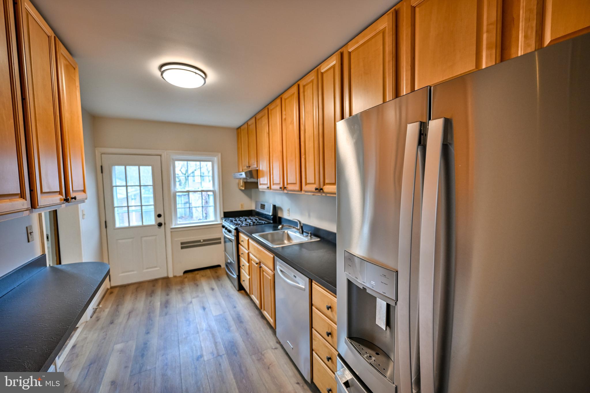 207 Murdock Road Baltimore, MD 21212 - Photo 16 of 45 Galley kitchen with tons of cabinet space