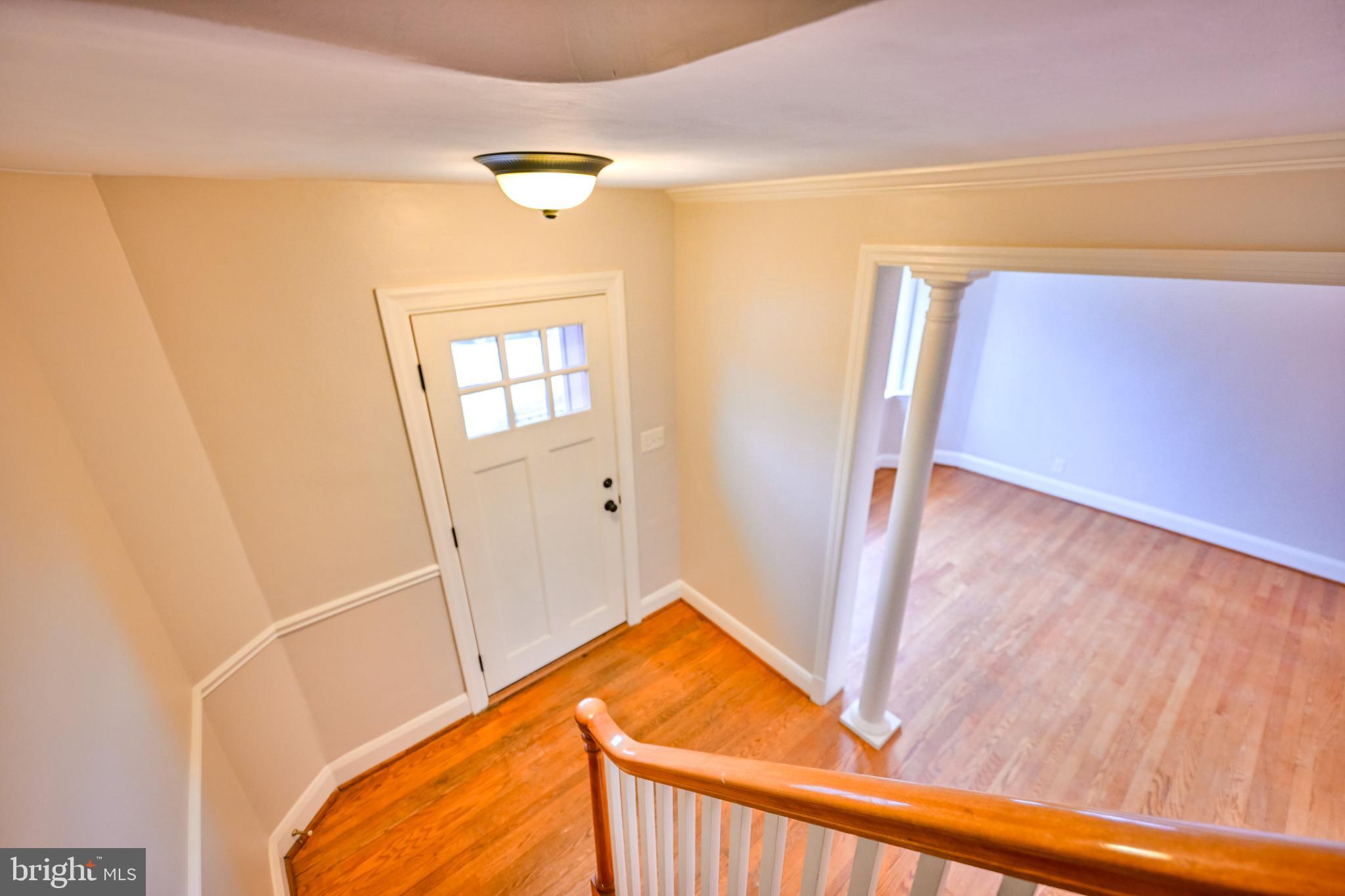 207 Murdock Road Baltimore, MD 21212 - Photo 17 of 45 Stairs to 2nd level from foyer