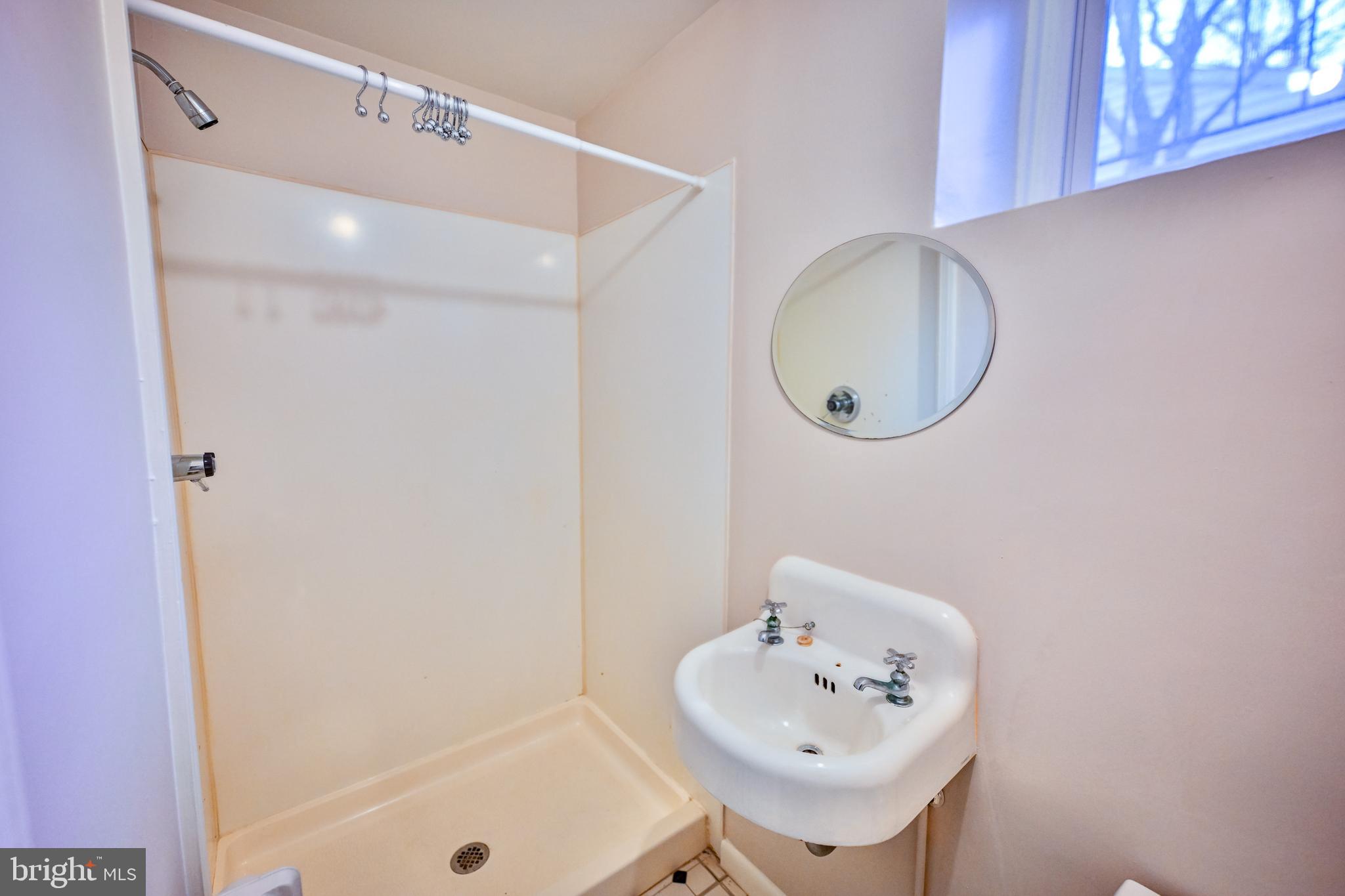 207 Murdock Road Baltimore, MD 21212 - Photo 37 of 45 Basement bathroom