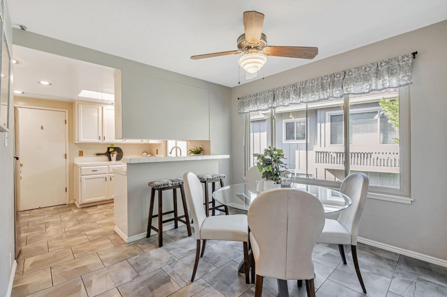 42 Weepingridge Court San Mateo, CA 94402 - Photo 14 of 45 a view of a dining room with furniture and a chandelier