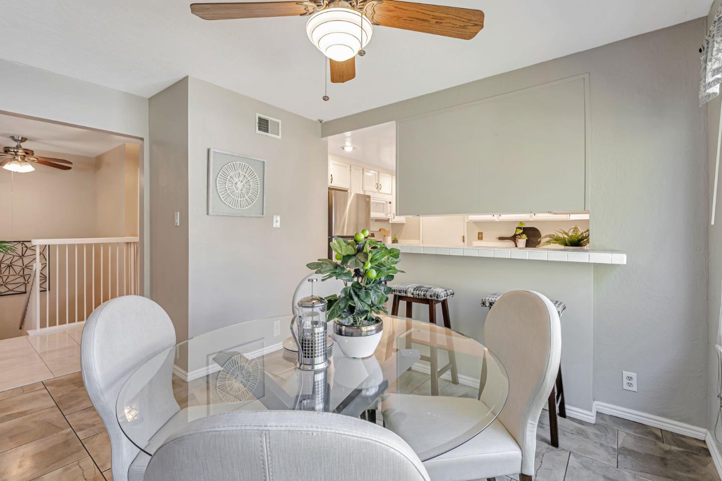 42 Weepingridge Court San Mateo, CA 94402 - Photo 15 of 45 a dining room with furniture and wooden floor