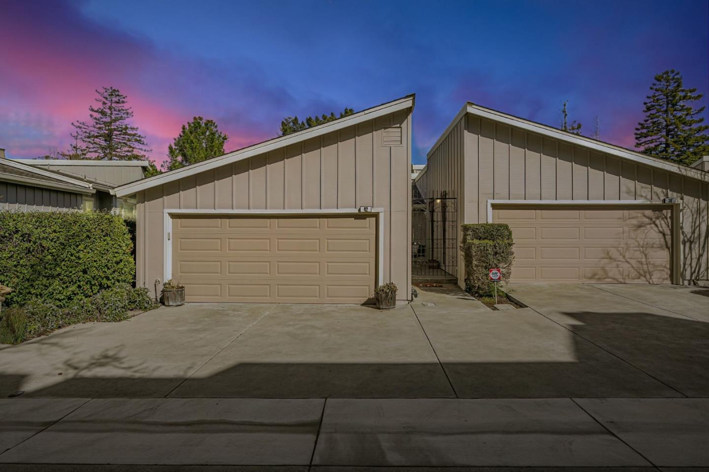 42 Weepingridge Court San Mateo, CA 94402 - Photo 2 of 45 a view of a house with a backyard and a garage