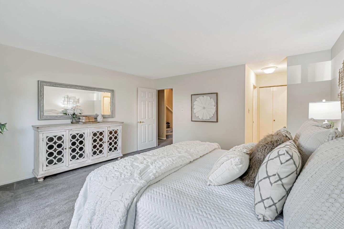 42 Weepingridge Court San Mateo, CA 94402 - Photo 26 of 45 a bedroom with a bed and a window