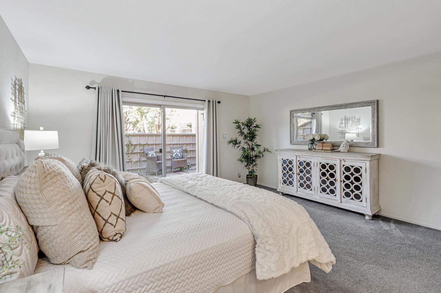 42 Weepingridge Court San Mateo, CA 94402 - Photo 27 of 45 a bedroom with a bed and a window