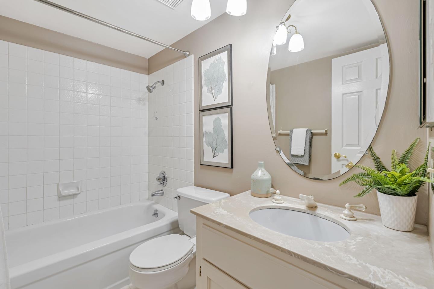 42 Weepingridge Court San Mateo, CA 94402 - Photo 29 of 45 a bathroom with a granite countertop sink a toilet a large mirror and shower