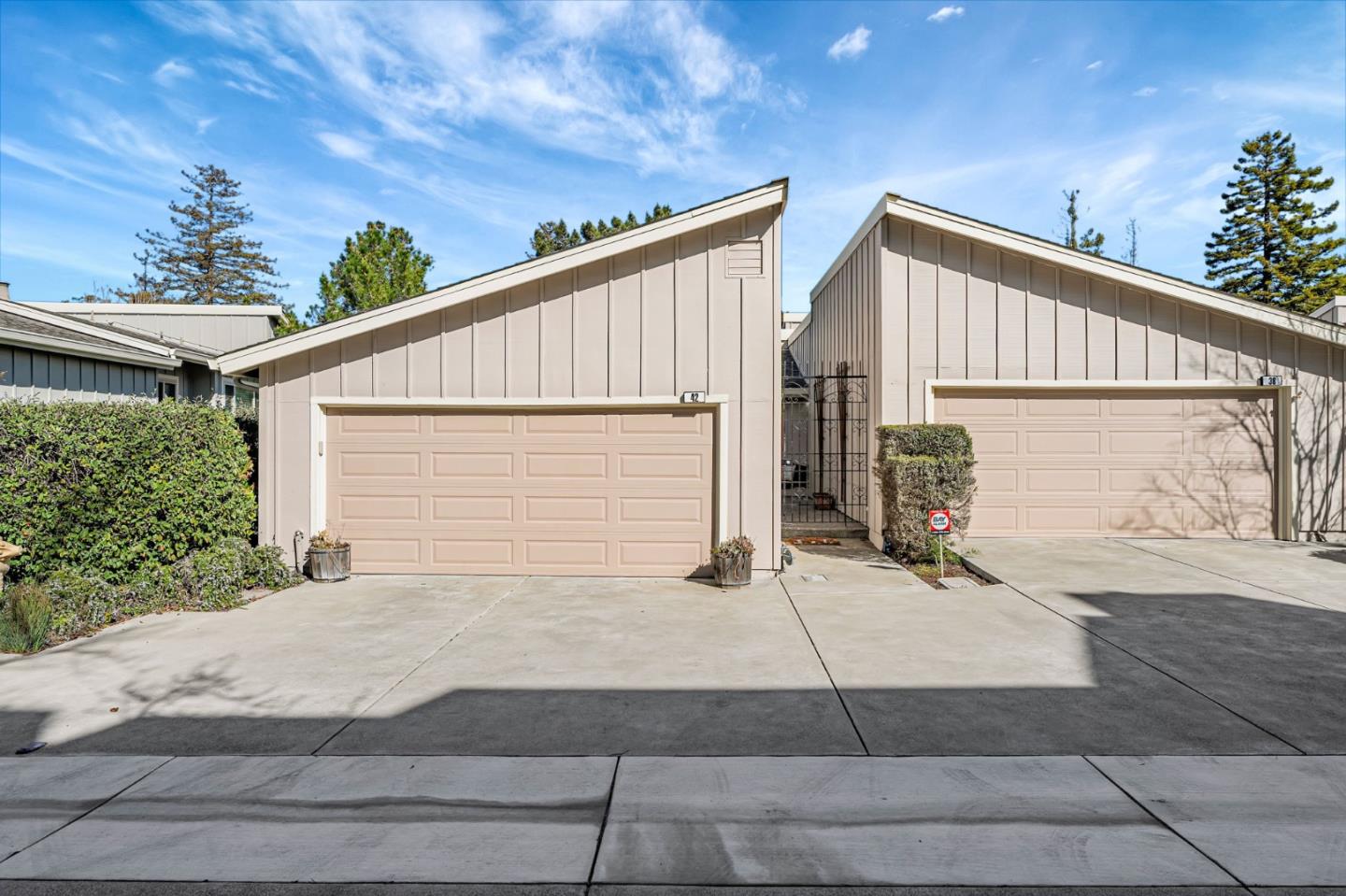 42 Weepingridge Court San Mateo, CA 94402 - Photo 3 of 45 a view of a house with a backyard and a garage