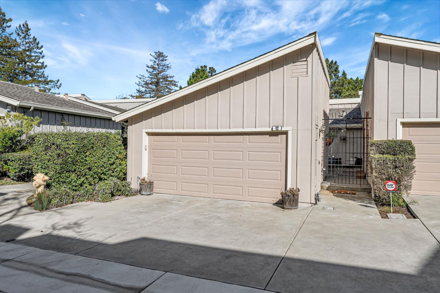 42 Weepingridge Court San Mateo, CA 94402 - Photo 5 of 45 a view of backyard with wheel chair potted plants and large tree