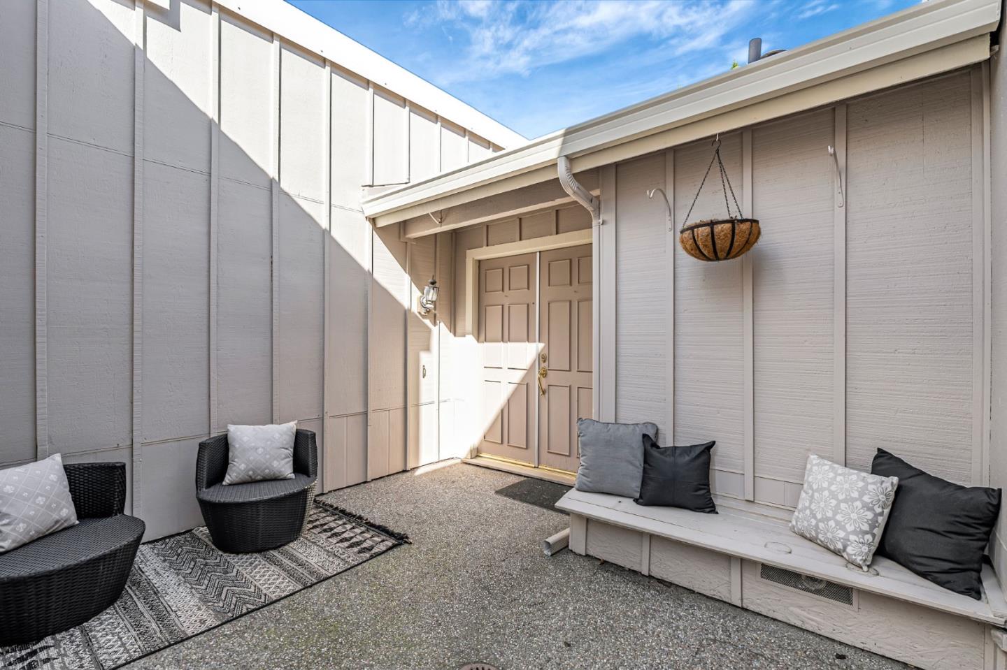 42 Weepingridge Court San Mateo, CA 94402 - Photo 6 of 45 a living room with furniture and a potted plant