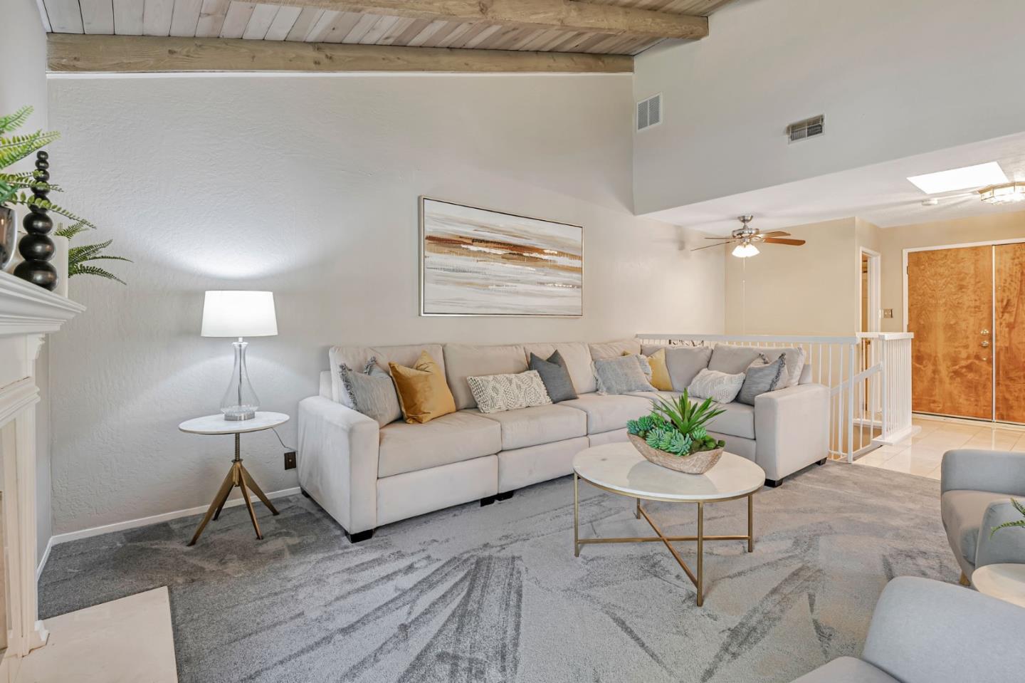 42 Weepingridge Court San Mateo, CA 94402 - Photo 9 of 45 a living room with furniture and a lamp