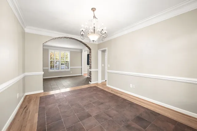 a bedroom with a bed furniture and a window