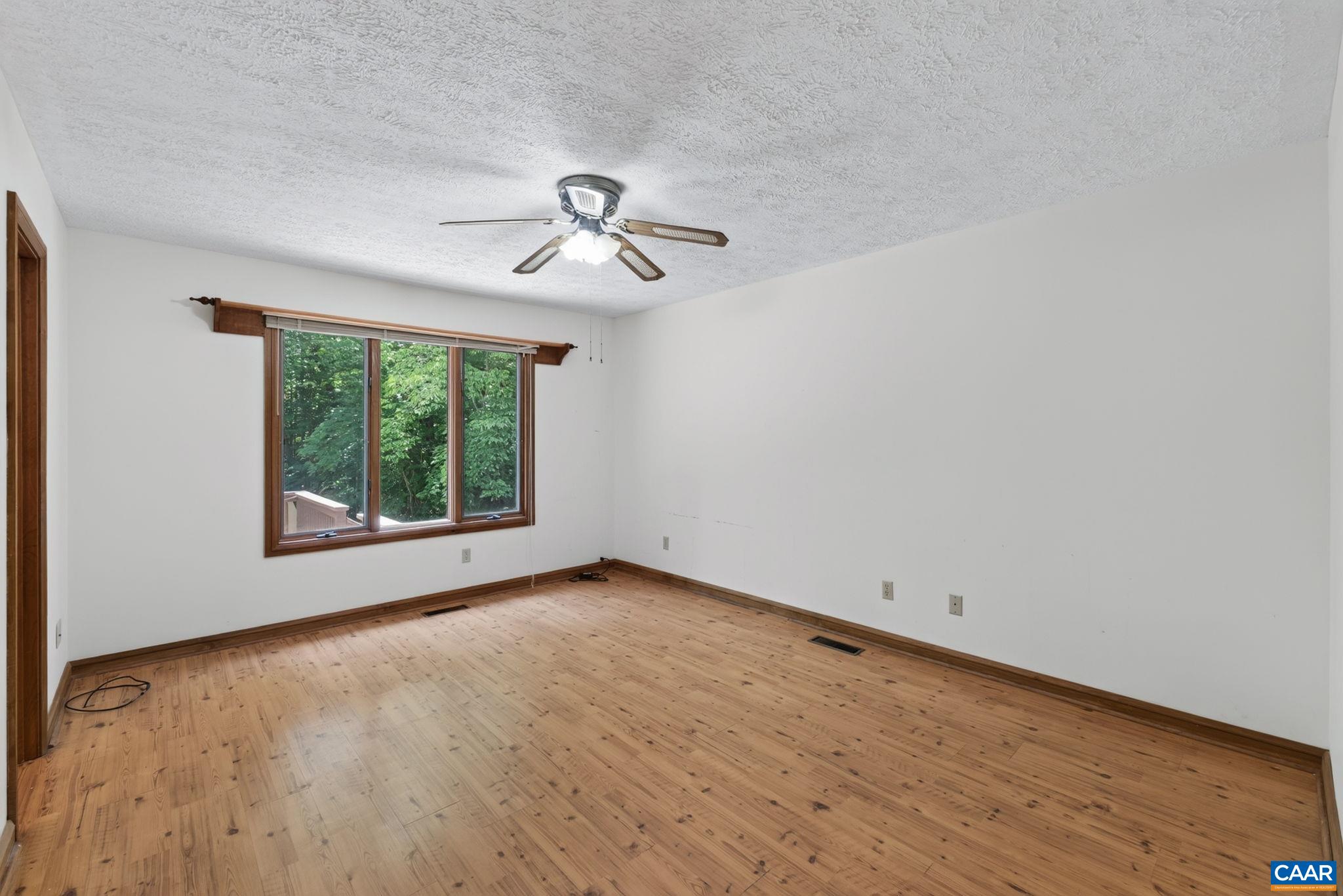 9 Timberlake Terrace Palmyra, VA 22963 - Photo 18 of 35 wooden floor in an empty room with a window