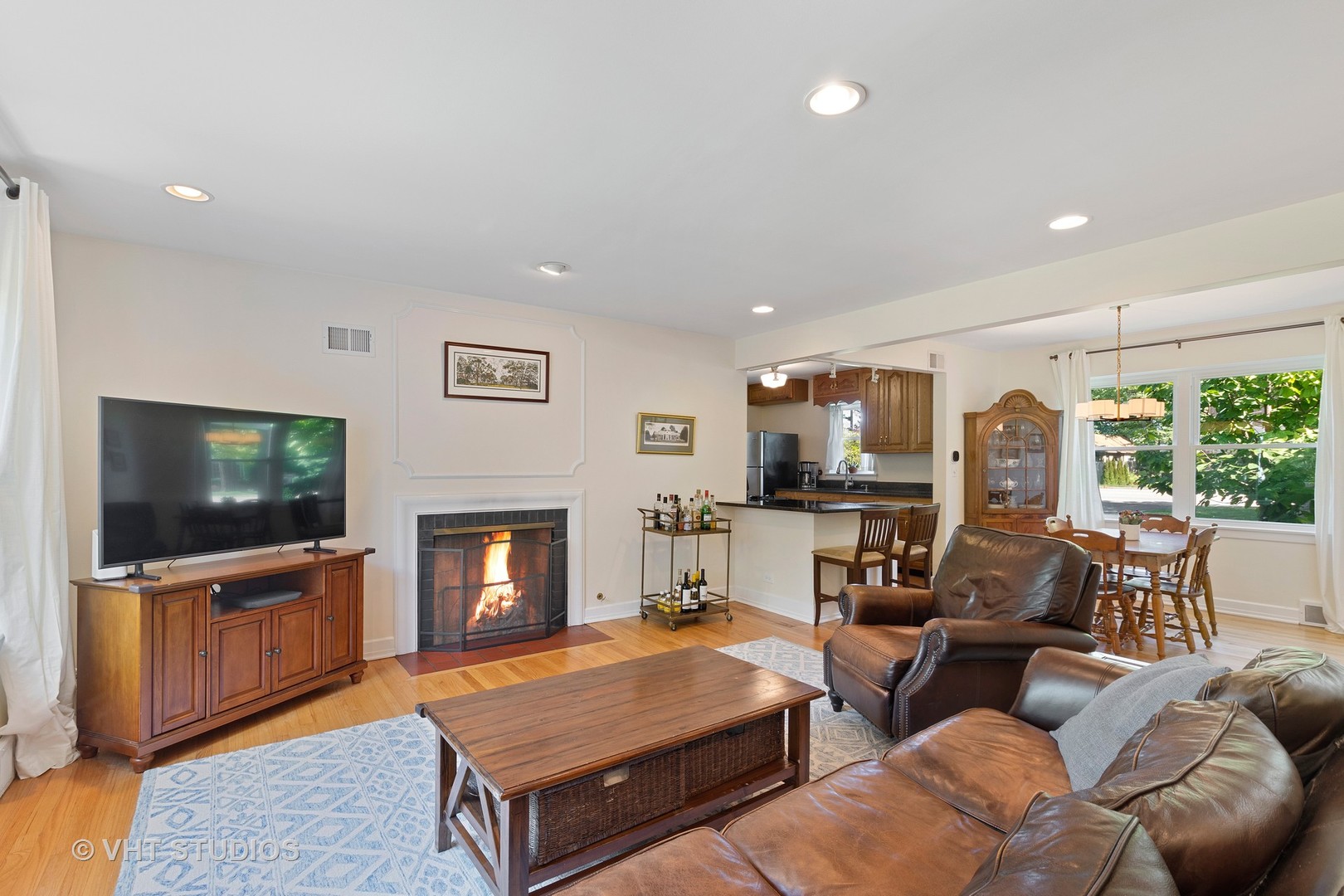 350 Wagner Road Northfield, IL 60093 - Photo 2 of 12 a living room with furniture and a flat screen tv