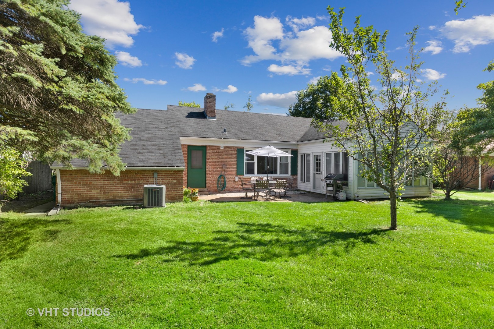 350 Wagner Road Northfield, IL 60093 - Photo 11 of 12 a front view of a house with yard and green space