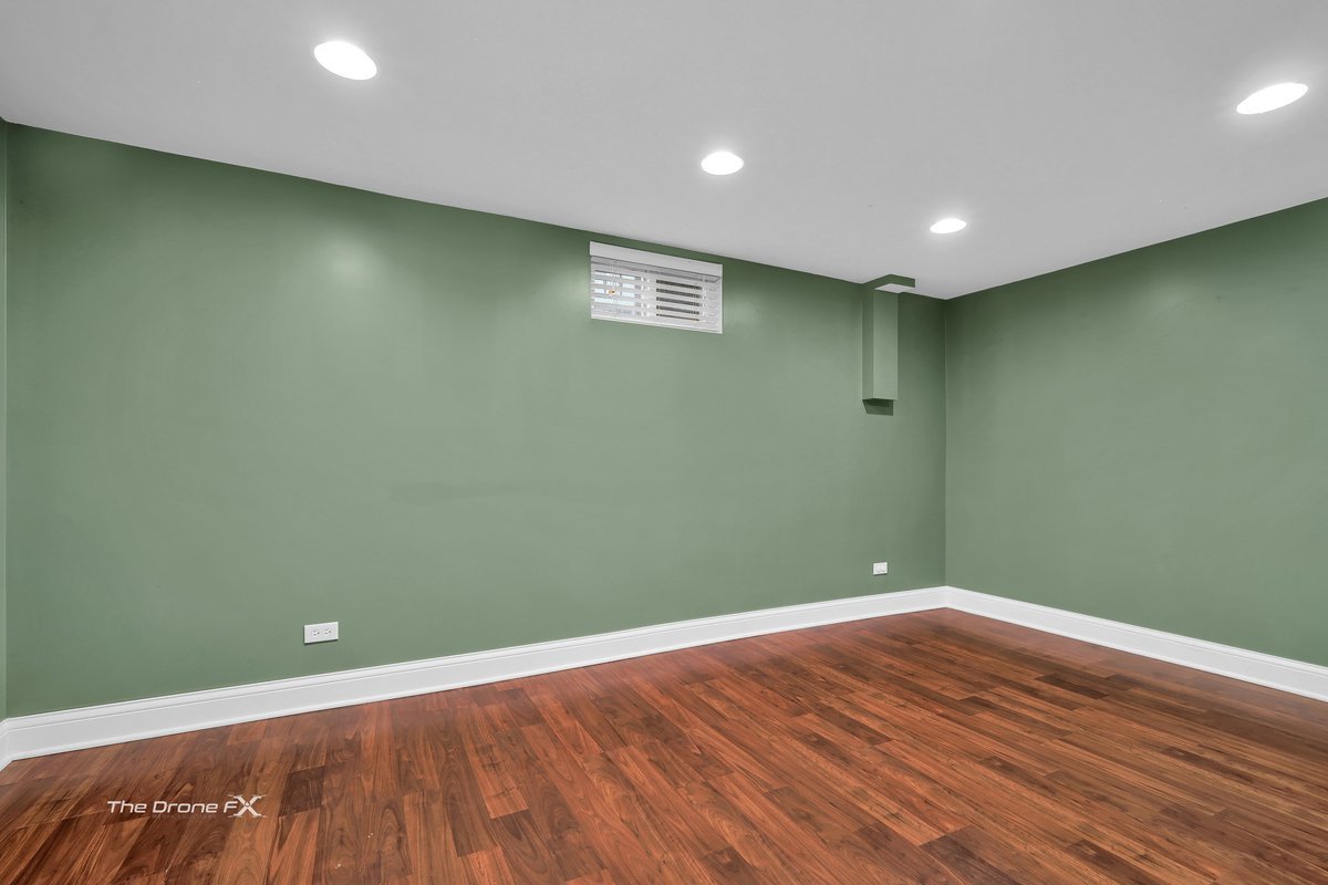 714 Delles Road Wheaton, IL 60189 - Photo 14 of 18 an empty room with wooden floor