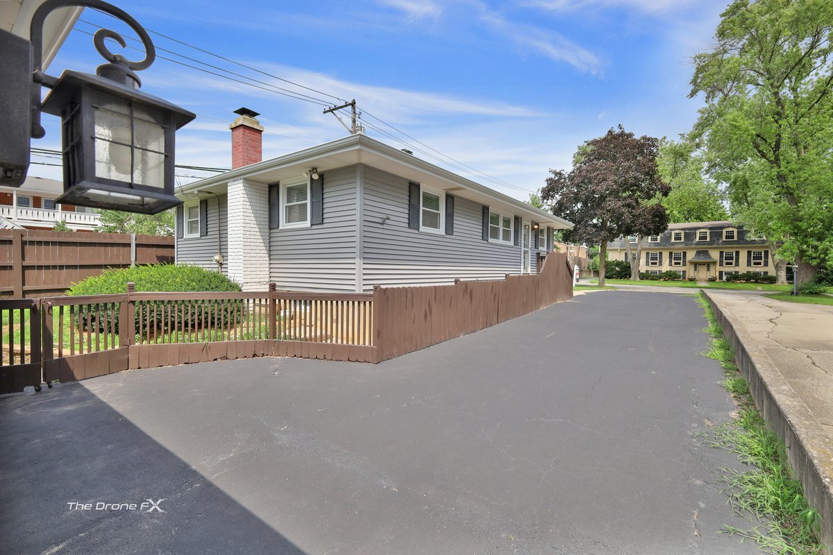 714 Delles Road Wheaton, IL 60189 - Photo 18 of 18 a view of a house with a yard