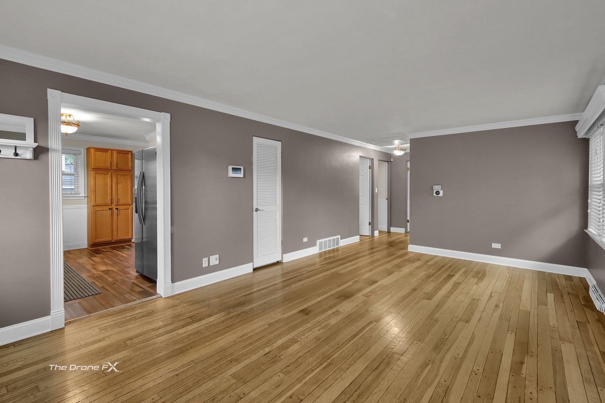 714 Delles Road Wheaton, IL 60189 - Photo 3 of 18 a view of an empty room and wooden floor