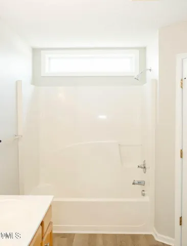 a bathroom with a bathtub