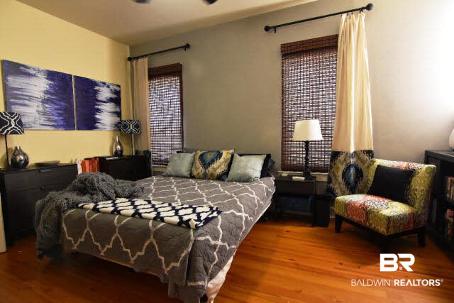 13848 Elmwood Court Stapleton, AL 36578 - Photo 16 of 27 The guest suite has comfortable bedroom with closet and separate bath. Would make wonderful In-Law Suite or Office. Has separate entrance. Located on main floor.