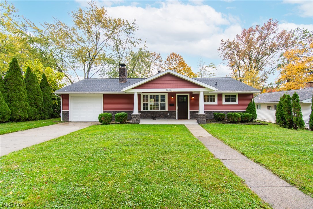1565 Merle Road Salem, OH 44460 - Photo 1 of 13 View of front of home with a front yard and a garage