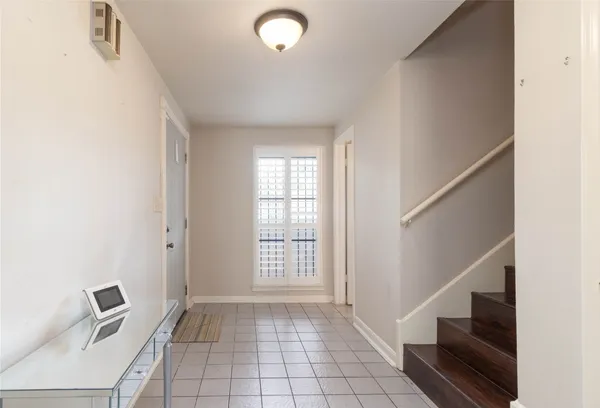 a view of an entryway with staircase