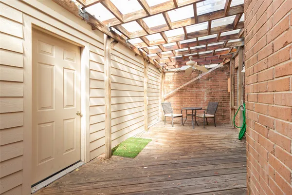 a view of entryway dining room and hall with wooden floor