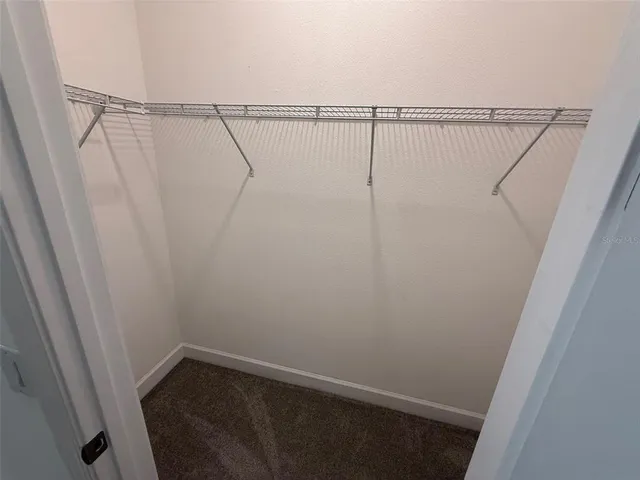 a view of small space with racks on the wall