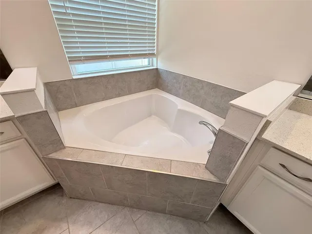 a bathroom with a bathtub