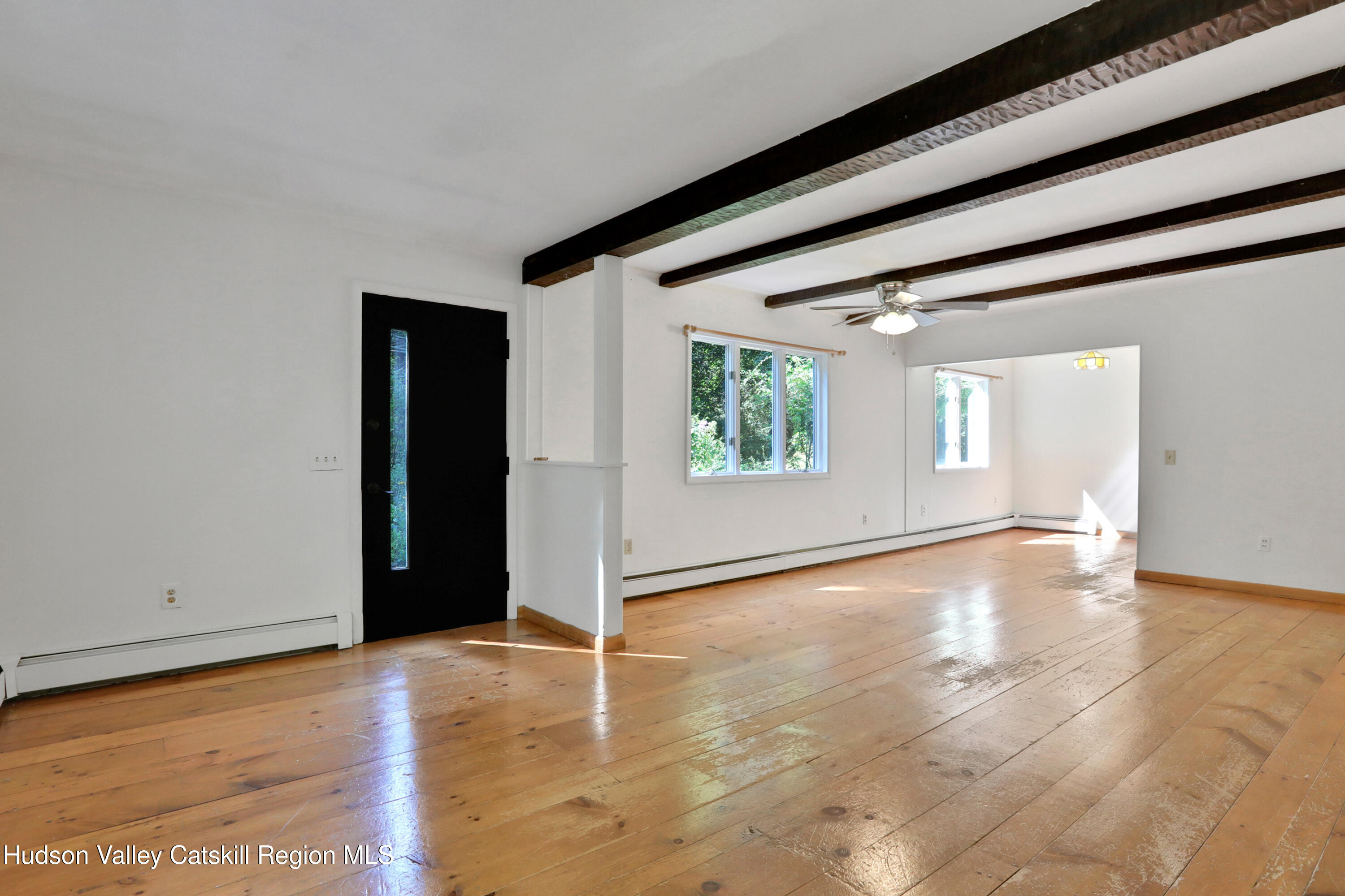 197 Old Rte 32 Saugerties, NY 12477 - Photo 6 of 31 a view of an empty room with window and wooden floor