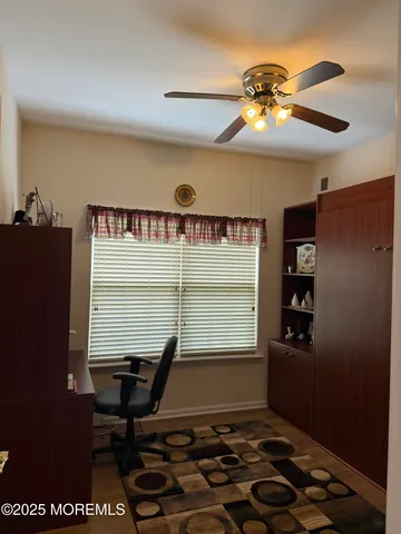 a room with furniture and a window