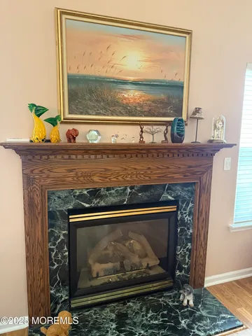 a fireplace with a clock on top of it