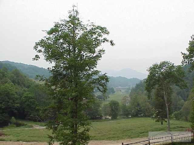 Lot #14 Gable Farm Road Boone, NC 28607 - Photo 1 of 1 an aerial view of a residential houses with yard and trees