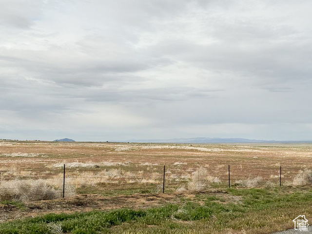 1000 South Foothill Boulevard Delta, UT 84624 - Photo 24 of 33 View of yard with a view of rural / pastoral area and a mountain view