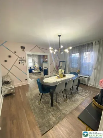 a kitchen with stainless steel appliances wooden cabinets a sink and a stove