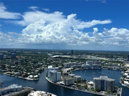 a view of a city with tall buildings