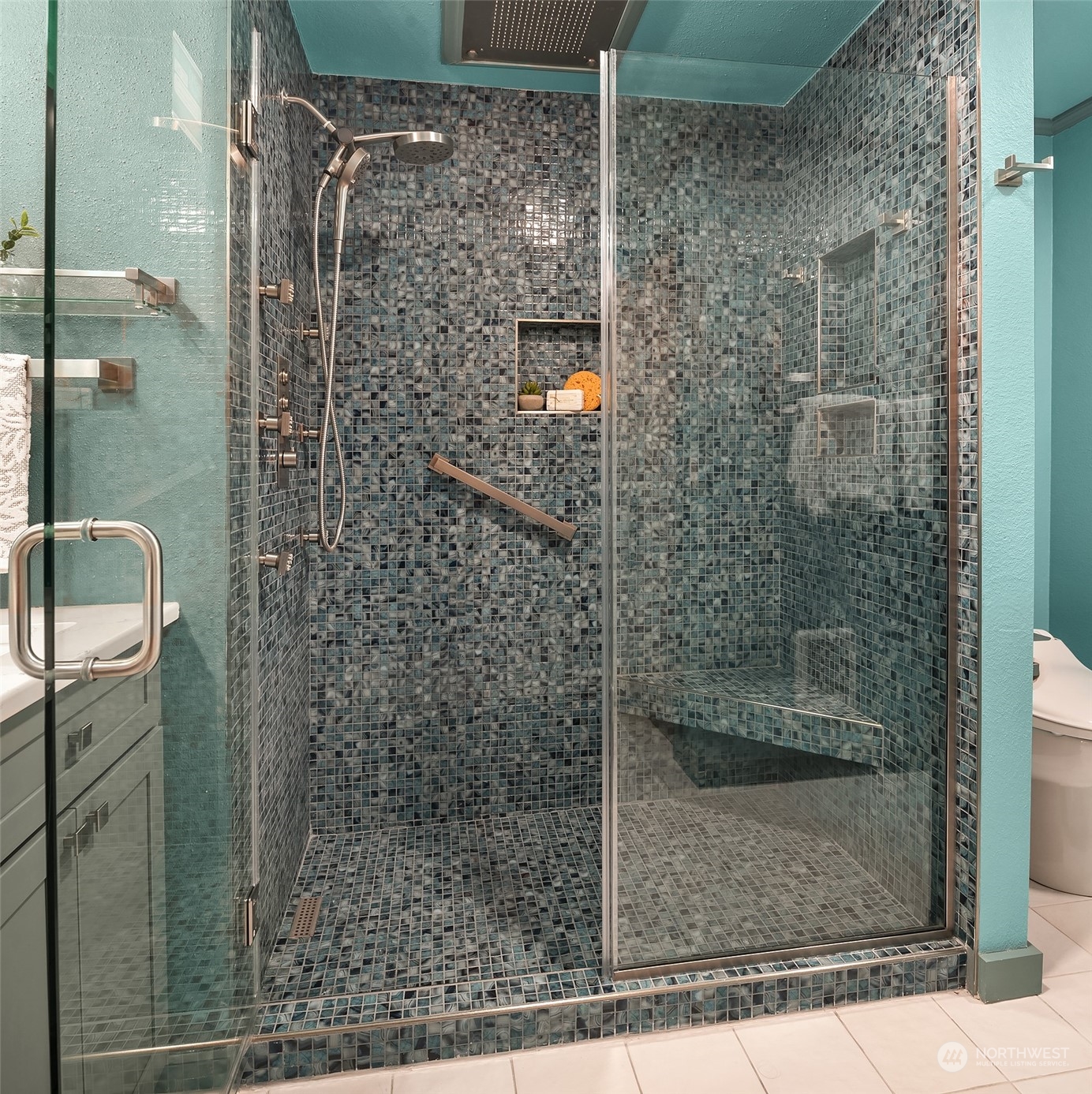 1615 Eagle Ridge Drive South, Unit 4 Renton, WA 98055 - Photo 24 of 29 a bathroom with a shower